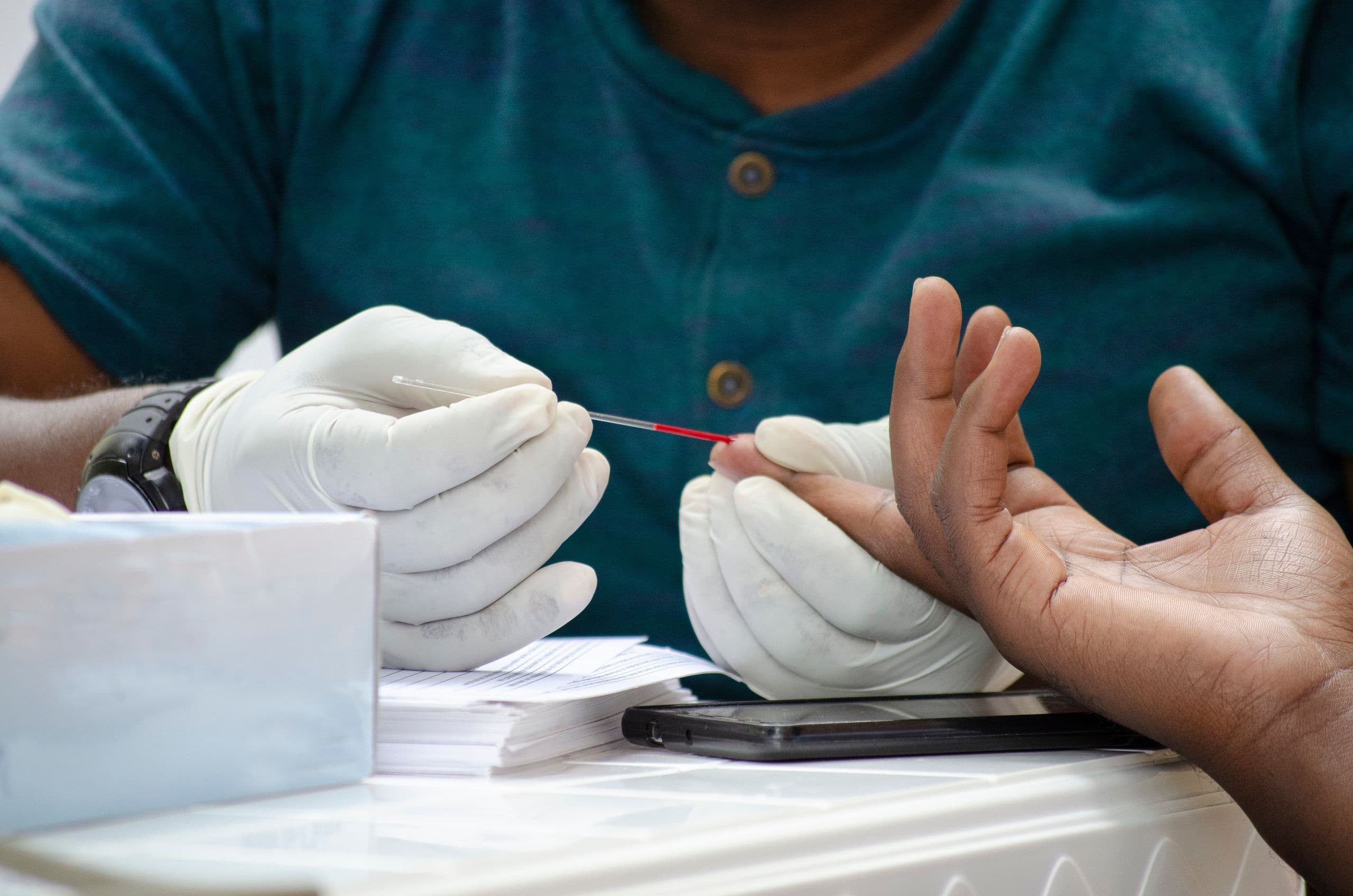 A client getting tested for hepatitis B at Inocul8 Clinic Lagos