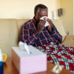 old man coughs due to pneumonia infection