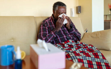 old man coughs due to pneumonia infection