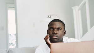 Picture of a man thinking if his daughters should receive the HPV Vaccine.