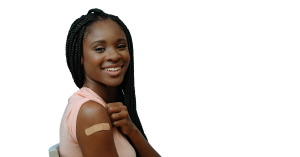 Smiling young woman with a bandage on her arm after receiving the HPV vaccine.
