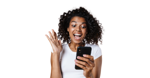 Hepatitis B vaccine near me - Excited young Black woman with curly hair looking at her smartphone, happy to find a vaccination centre.